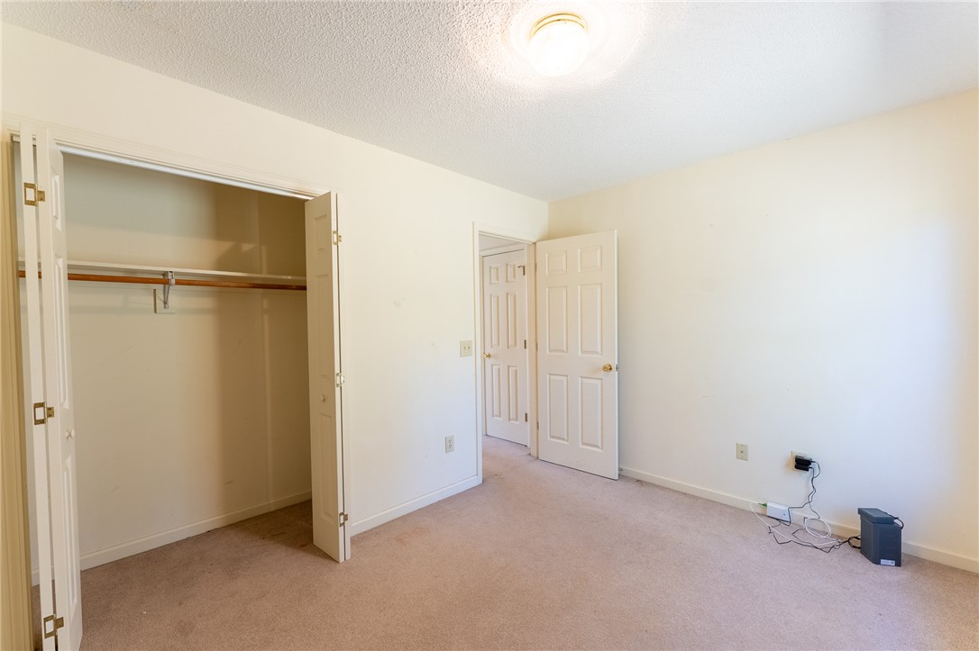 102 Roderick Drive Seneca, SC 29678 - Photo 20 of 23 This cozy bedroom features plush carpeting, a closet, and easy access to an adjacent room.