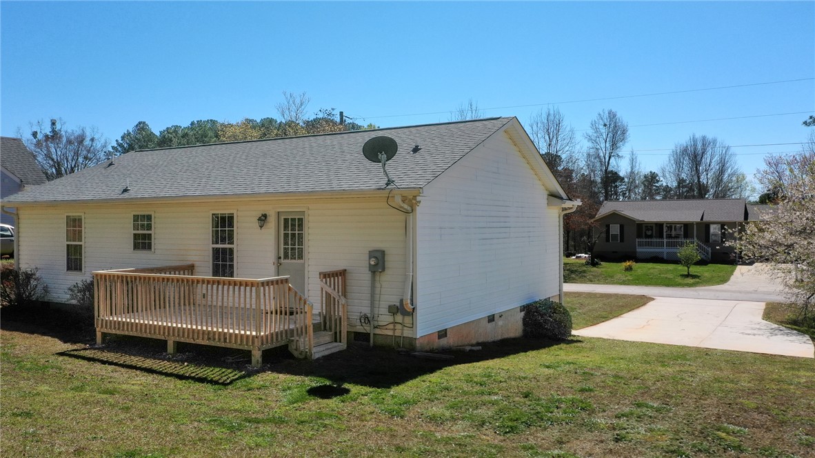 102 Roderick Drive Seneca, SC 29678 - Photo 3 of 23 This residence features a deck and ample yard space, perfect for outdoor activities.
