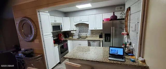 $1,550 | 2800 North Atlantic Avenue, Unit 405, Daytona Beach, FL 32118