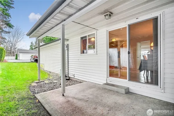 a house view with a backyard space