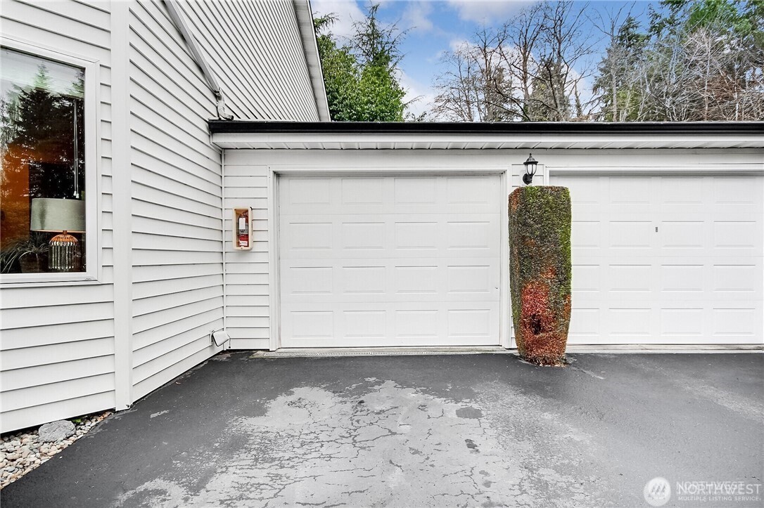 4514 Southwest 319th Place, Unit D Federal Way, WA 98023 - Photo 2 of 21 a view of a garage