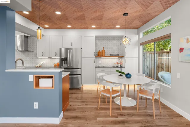 a living room with furniture and next to a window