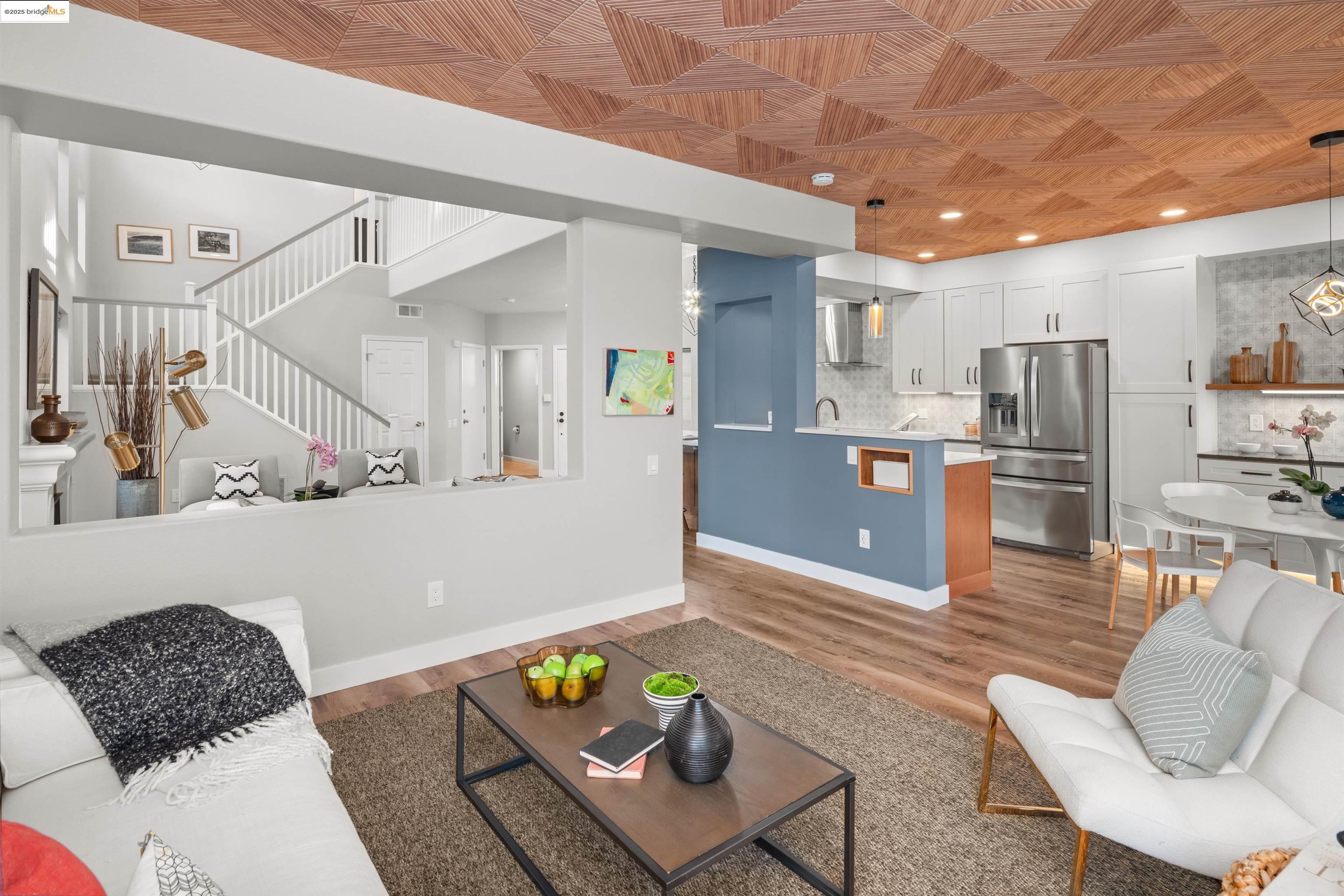 35 Southwind Circle Richmond, CA 94804 - Photo 21 of 59 a living room with furniture and a wooden floor