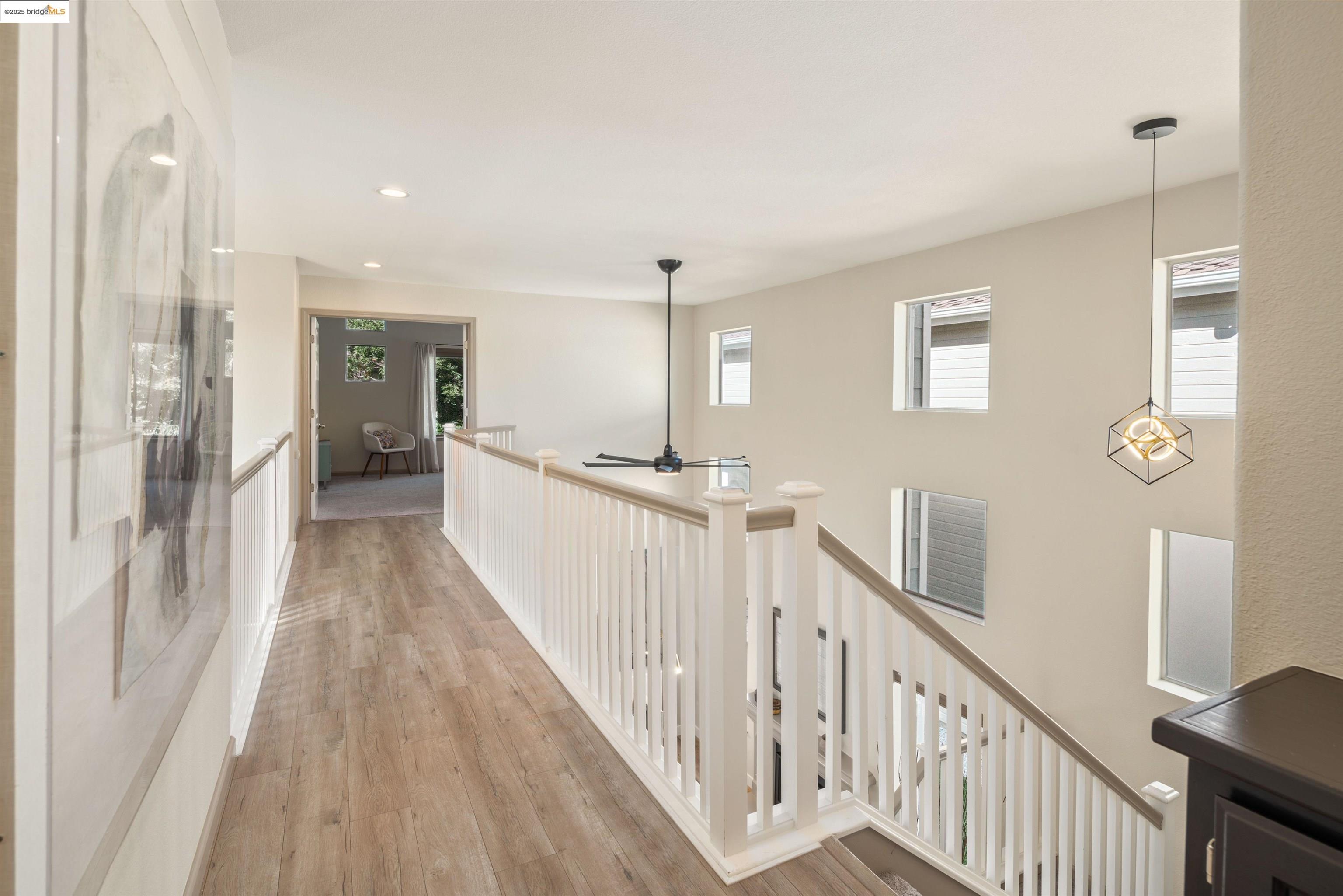 35 Southwind Circle Richmond, CA 94804 - Photo 25 of 59 a view of a hallway with wooden floor and windows