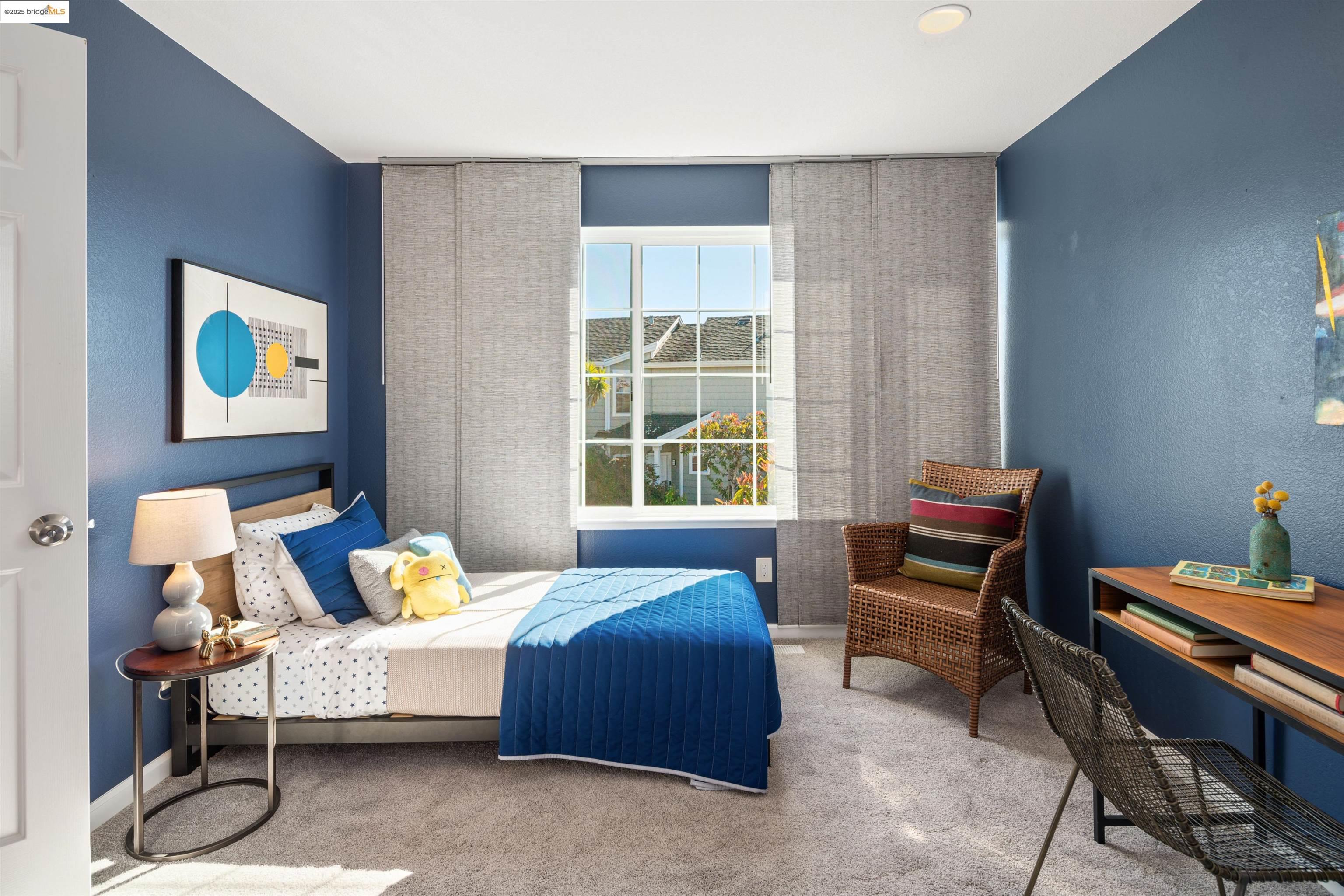 35 Southwind Circle Richmond, CA 94804 - Photo 39 of 59 a bedroom with a bed and a desk