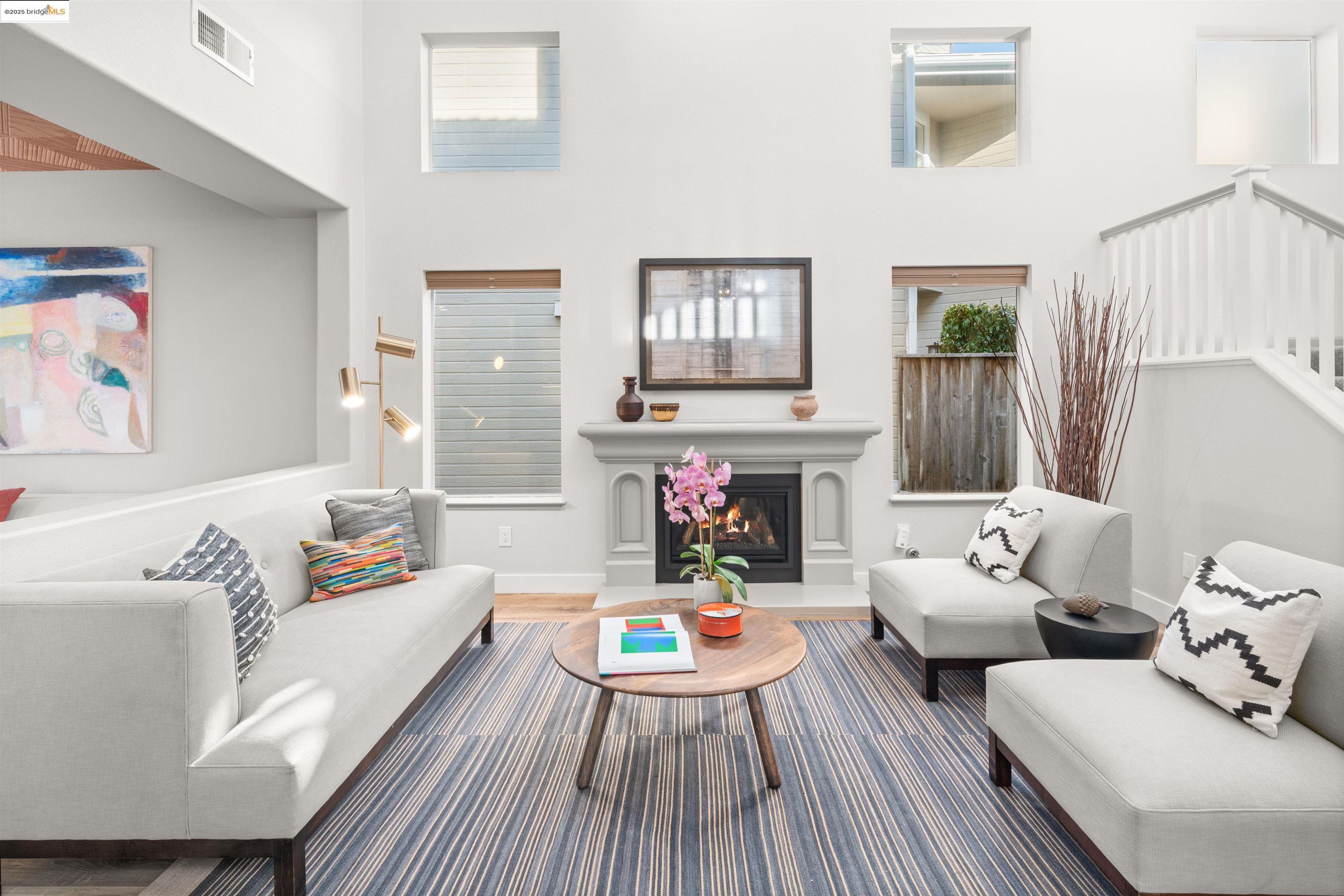 35 Southwind Circle Richmond, CA 94804 - Photo 8 of 59 a living room with fireplace furniture and a wooden floor