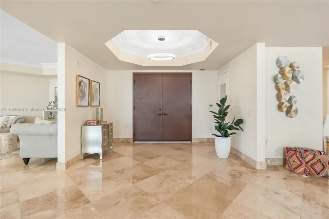 a spacious bedroom with a large bed and a large window