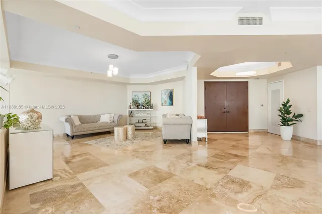 a kitchen with a refrigerator and a sink