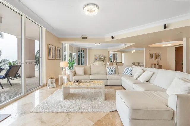 a view of a palm trees front of a house