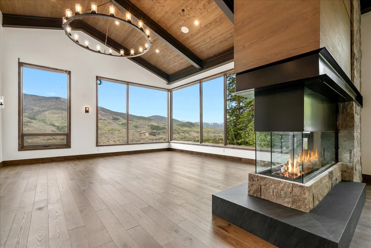 1615 Golden Eagle Road Silverthorne, CO 80498 - Photo 12 of 47 a view of room with furniture and wooden floor