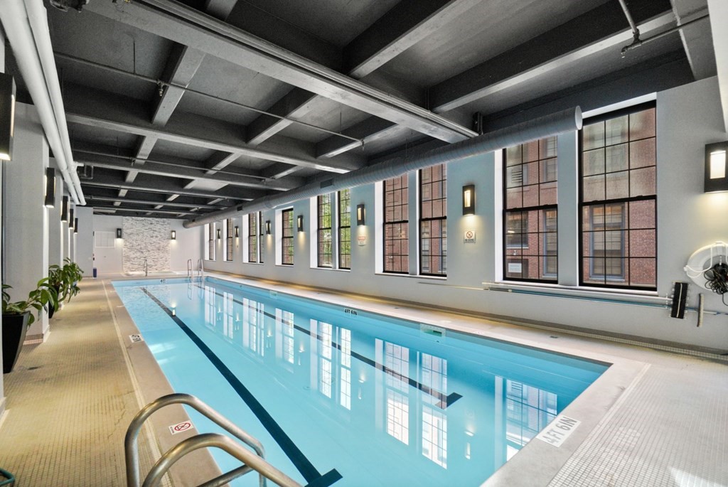 1245 Adams Street, Unit B210 Boston, MA 02124 - Photo 21 of 23 a view of swimming pool with seating area