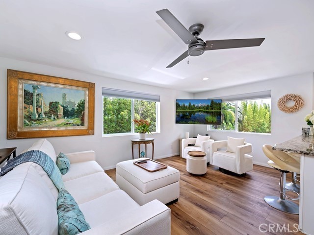 1570 Burgundy Road Encinitas, CA 92024 - Photo 16 of 47 a living room with furniture and a large window