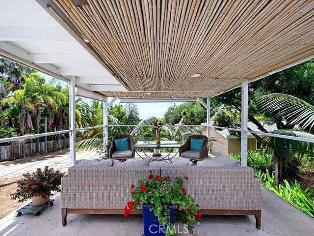 a garden view with a seating space