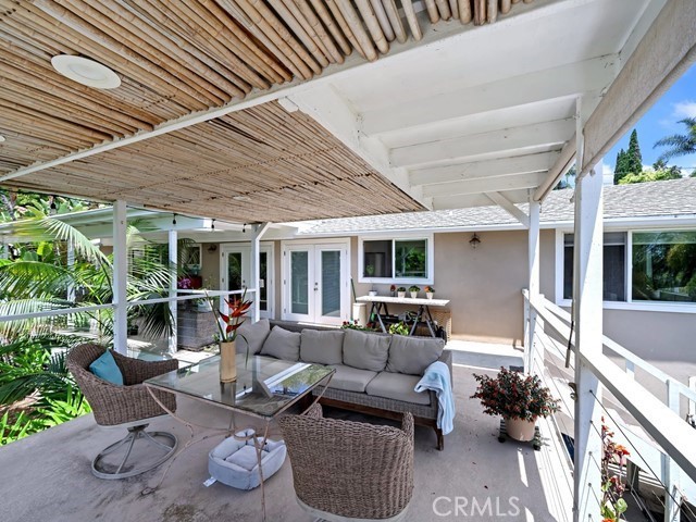 1570 Burgundy Road Encinitas, CA 92024 - Photo 26 of 47 a outdoor living space with furniture and garden view