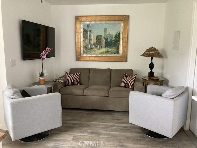 1570 Burgundy Road Encinitas, CA 92024 - Photo 37 of 47 a living room with furniture and a flat screen tv