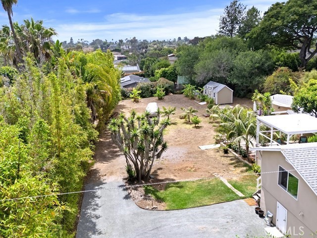 1570 Burgundy Road Encinitas, CA 92024 - Photo 41 of 47 a view of a garden with a fountain