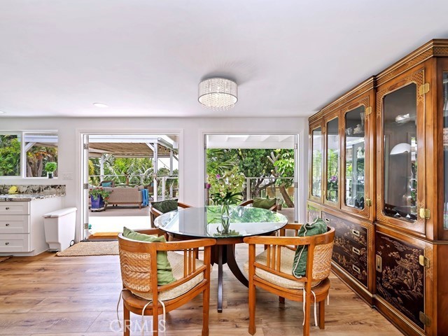 1570 Burgundy Road Encinitas, CA 92024 - Photo 10 of 47 a view of a dining room with furniture window and outside view