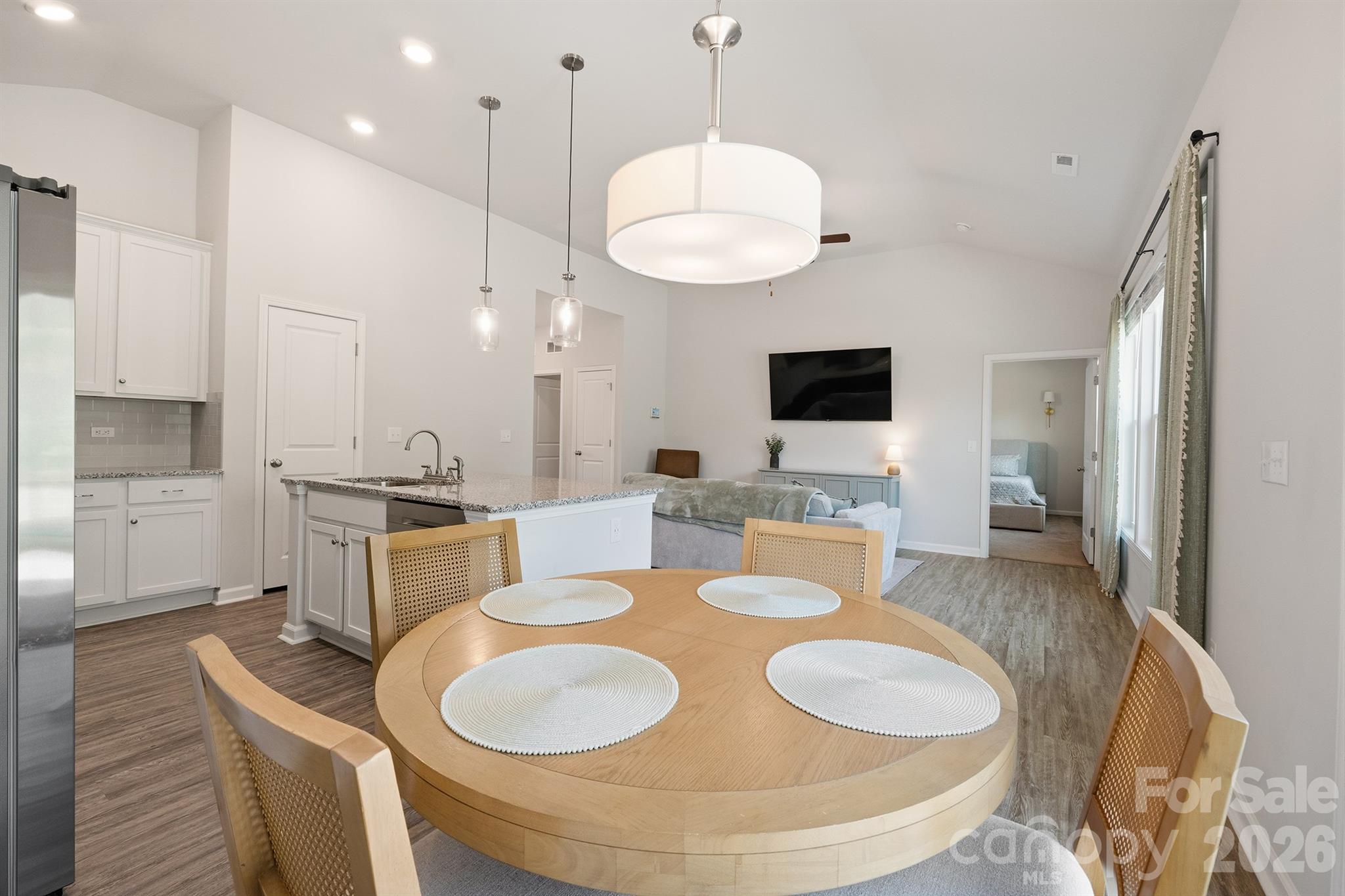 8220 Mccormick Street Terrell, NC 28682 - Photo 12 of 33 a large kitchen with a table and chairs