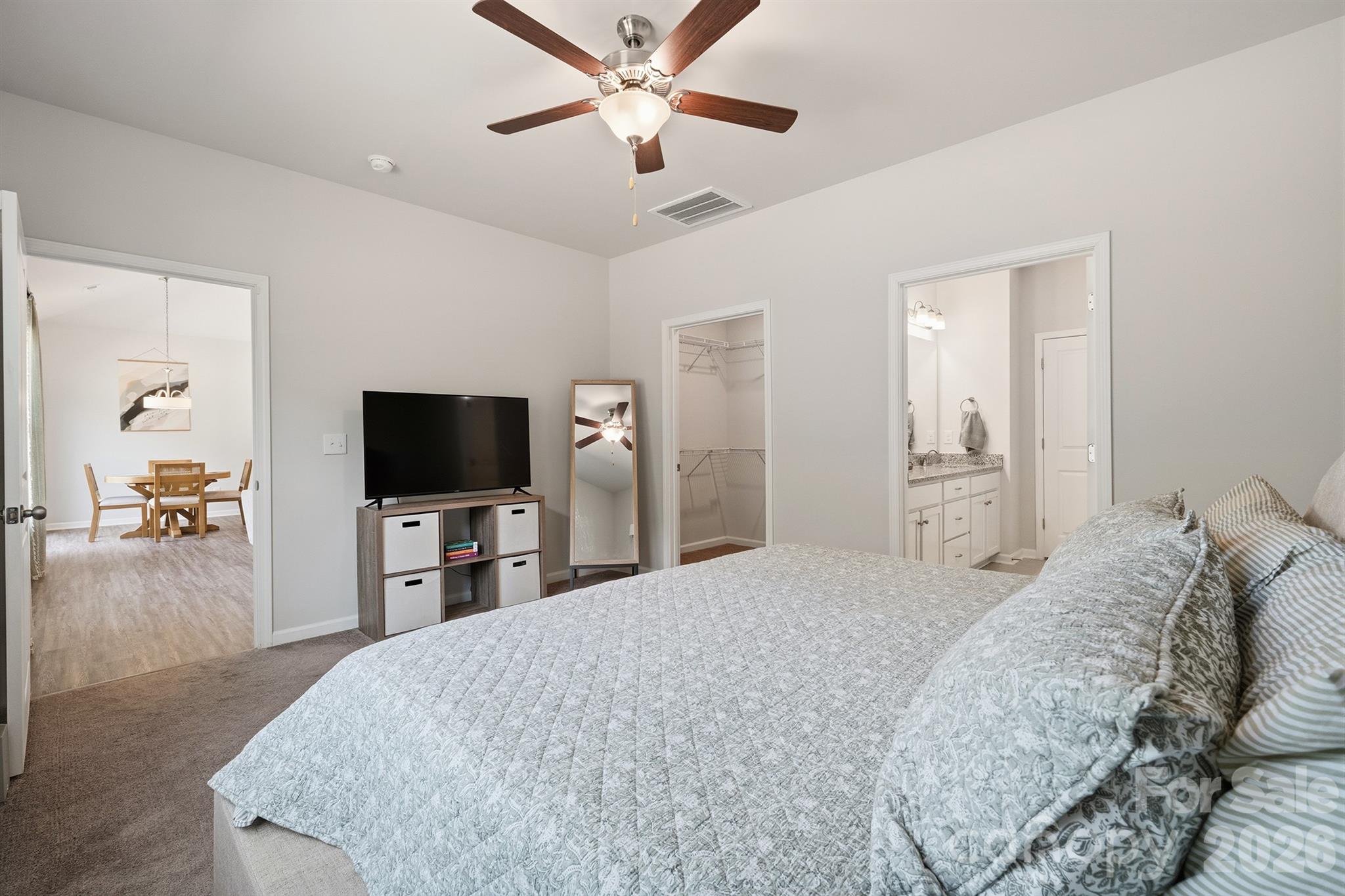 8220 Mccormick Street Terrell, NC 28682 - Photo 17 of 33 a bedroom with a bed and a flat screen tv