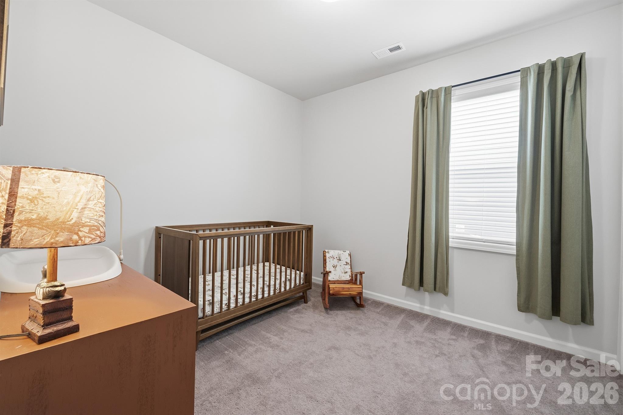 8220 Mccormick Street Terrell, NC 28682 - Photo 24 of 33 a view of livingroom with furniture and windows