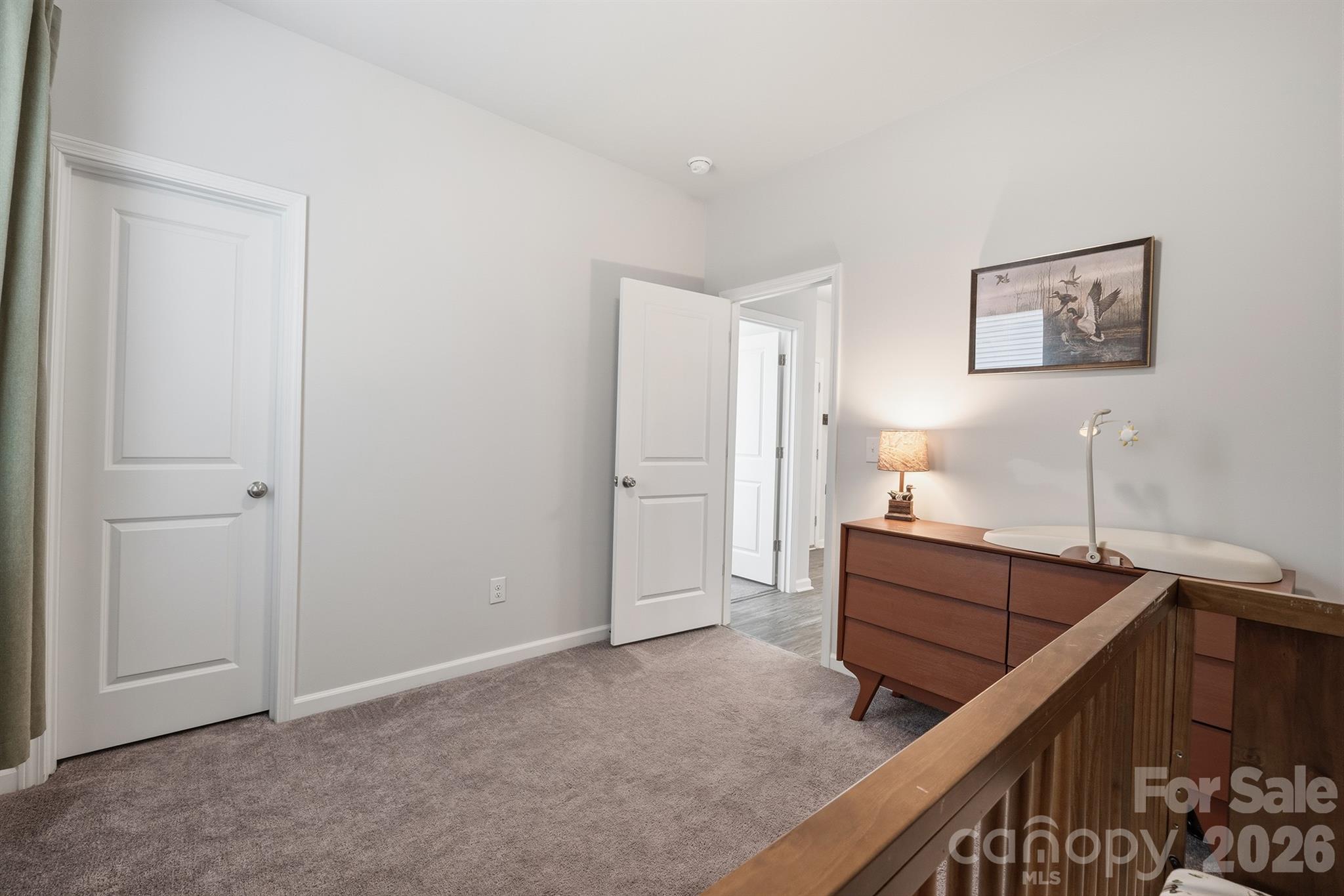 8220 Mccormick Street Terrell, NC 28682 - Photo 26 of 33 a view of room with furniture and wooden floor