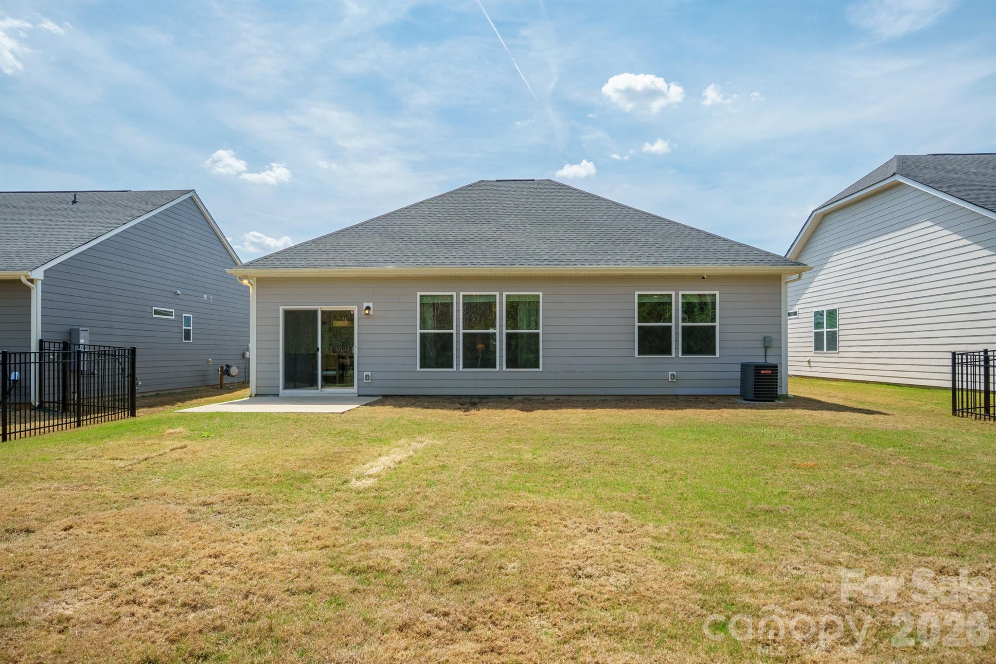 8220 Mccormick Street Terrell, NC 28682 - Photo 30 of 33 a view of a house with a swimming pool