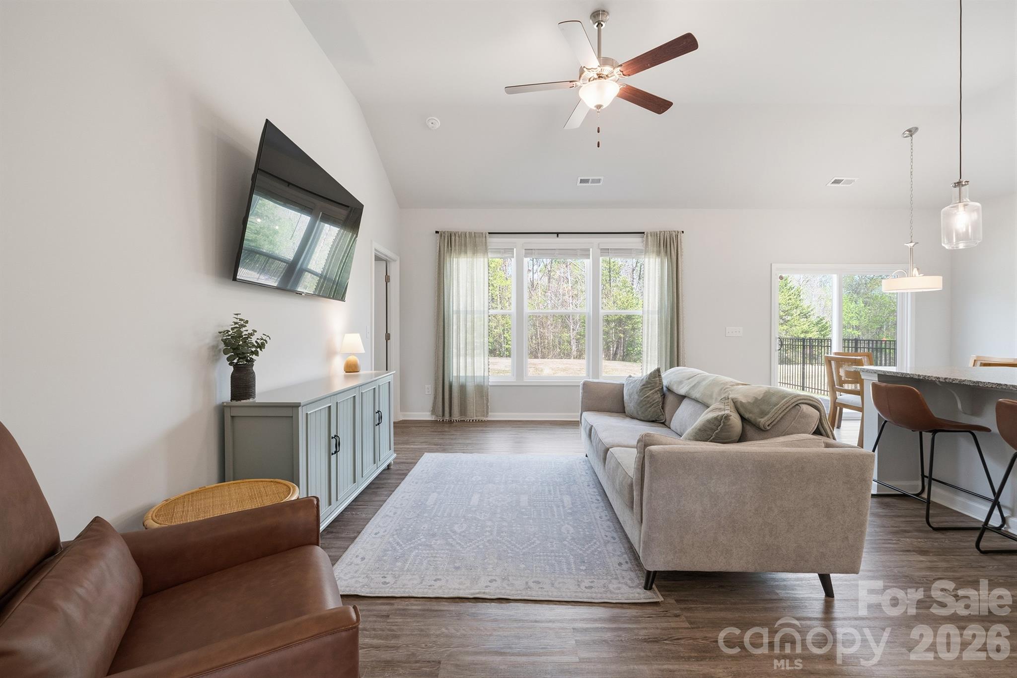 8220 Mccormick Street Terrell, NC 28682 - Photo 5 of 33 a living room with furniture and a flat screen tv