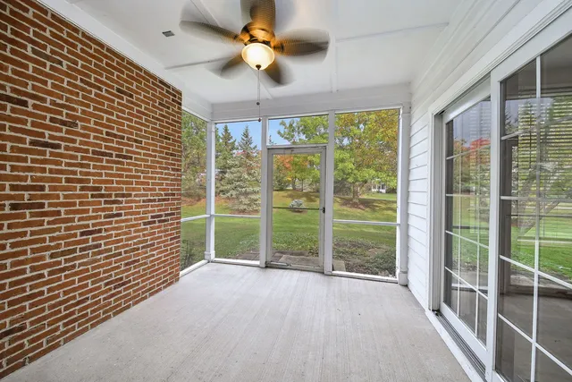a view of a room with windows