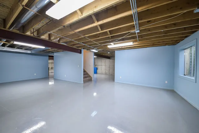 a view of empty room with windows