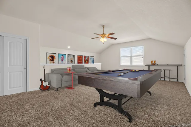 a living room with furniture and window