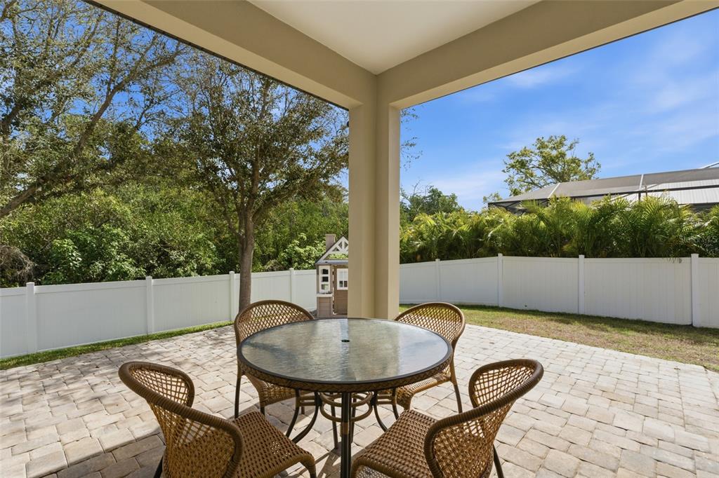 4437 Meridian Road Venice, FL 34293 - Photo 31 of 37 a view of balcony with a table and chairs
