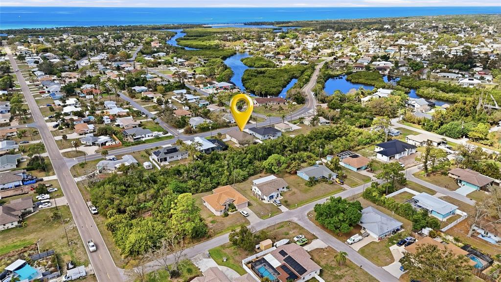 4437 Meridian Road Venice, FL 34293 - Photo 35 of 37 an aerial view of residential houses with outdoor space