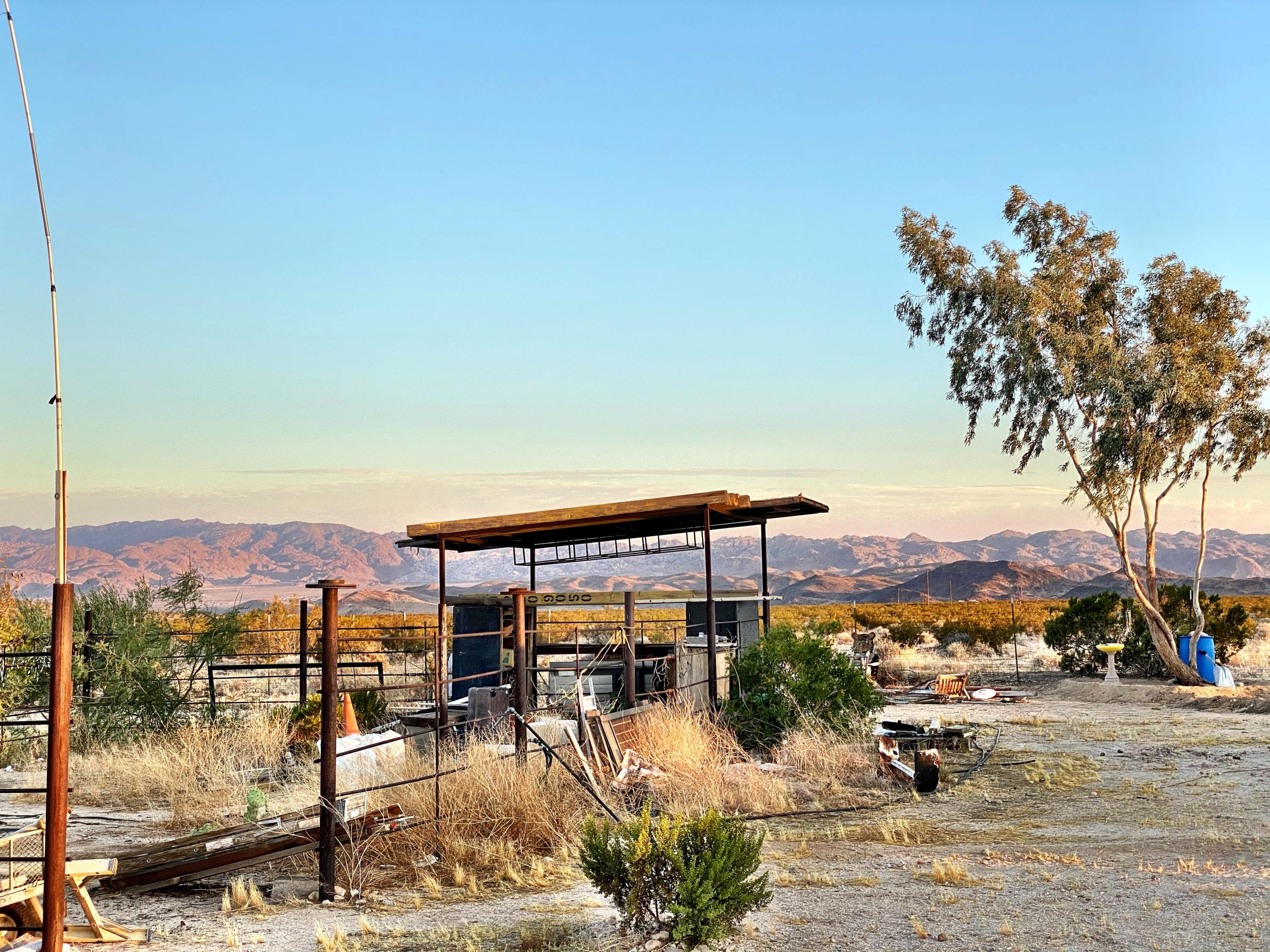 66855 Winters Road Joshua Tree, CA 92252 - Photo 5 of 19 a view of a swimming pool and a mountain