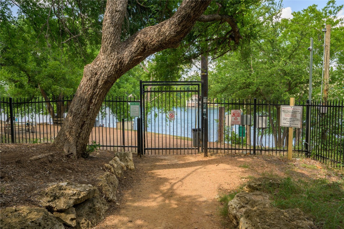 2016 Whitebead Trail Austin, TX 78734 - Photo 28 of 31 a view of a gate with a fence