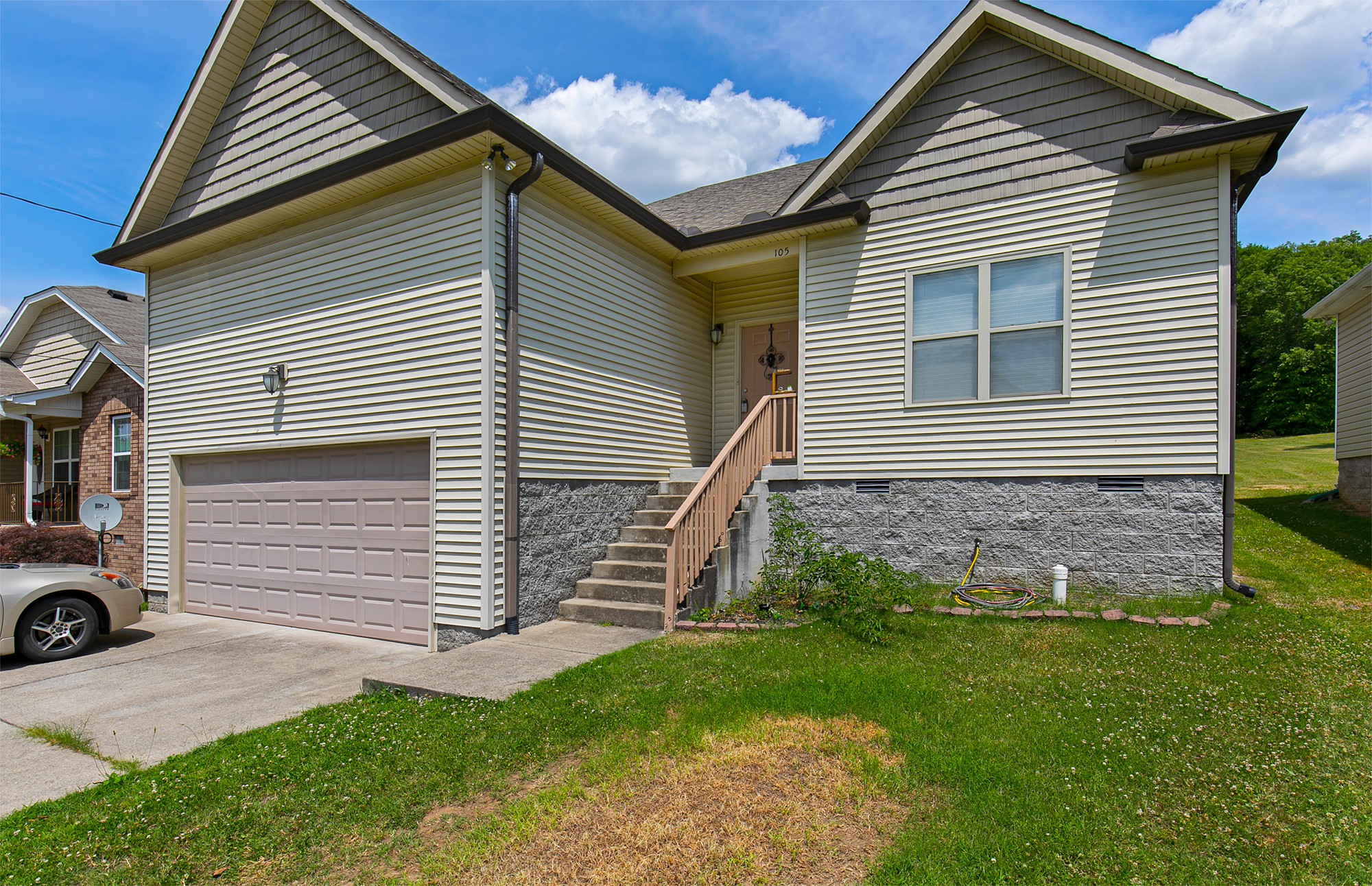 105 Larkin Springs Road Madison, TN 37115 - Photo 1 of 6 a front view of a house with a yard