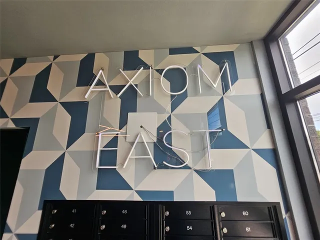 a balcony view with dining space and wooden floor