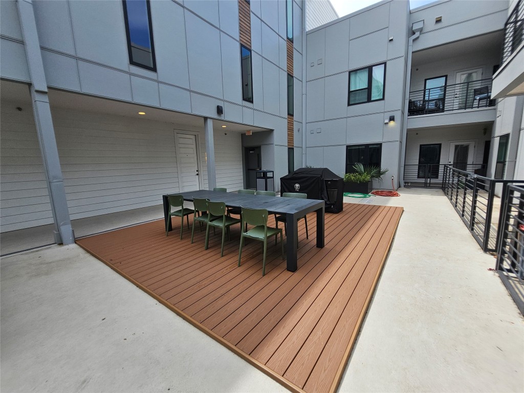 2220 Webberville Road, Unit 310 Austin, TX 78702 - Photo 33 of 39 a dining room with furniture and a fireplace
