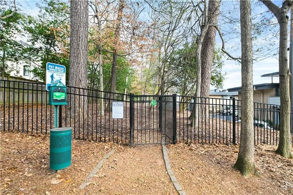 a view of a wrought iron fences in front of house