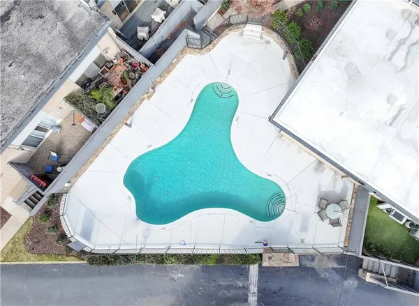 an aerial view of a swimming pool