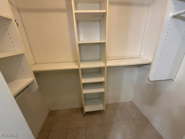 a view of an empty walk in closet