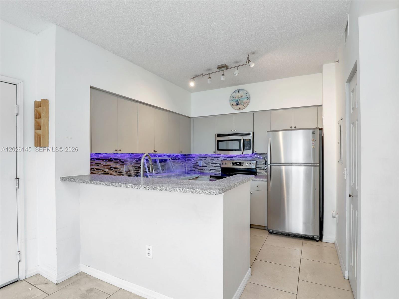 1180 Reserve Way, Unit 207 Naples, FL 34105 - Photo 10 of 31