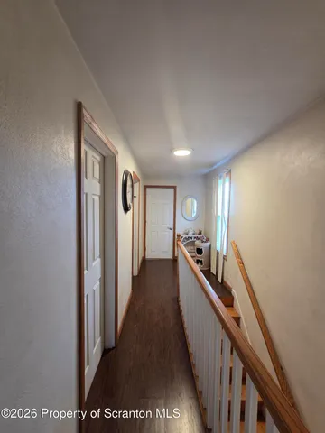 a view of hallway with stairs