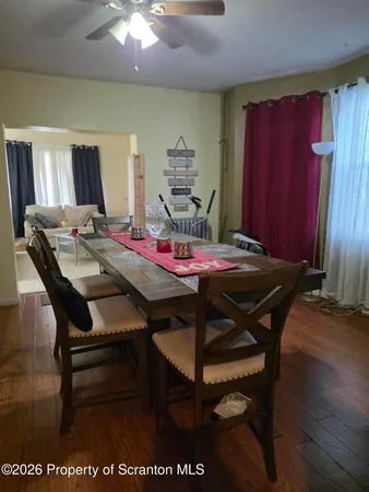 a view of a dining room with furniture
