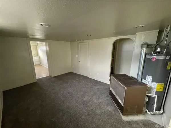 a view of an empty room with windows