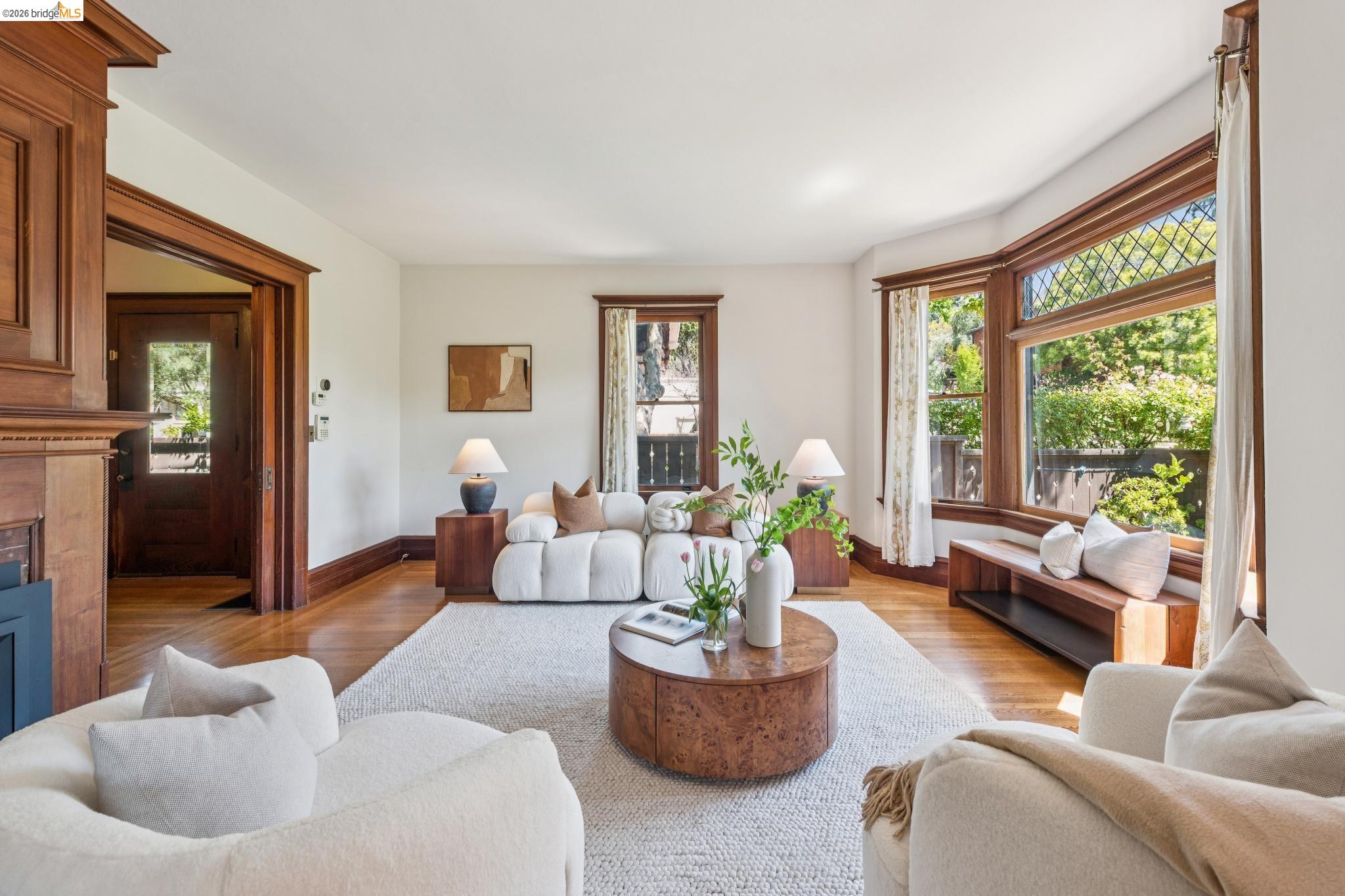 1490 Arch Street Berkeley, CA 94708 - Photo 8 of 57 a living room with furniture and a large window