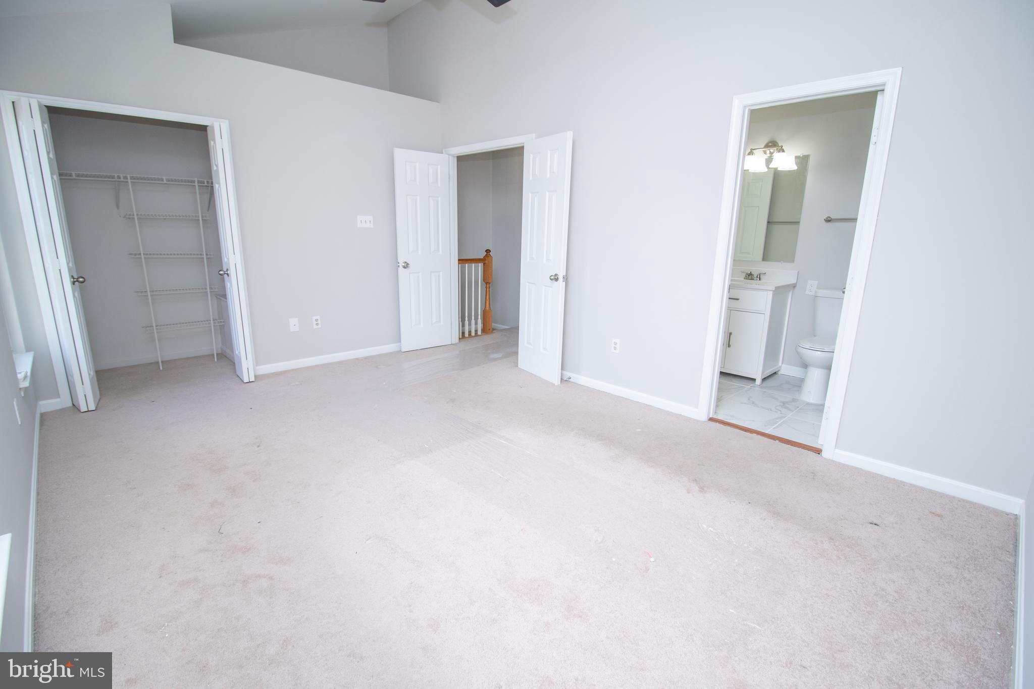 7708 Scatteree Road Severn, MD 21144 - Photo 24 of 41 an empty room with a bathroom