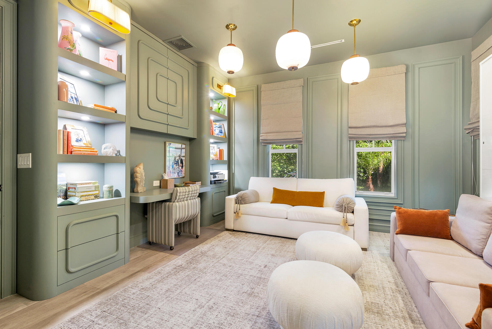 140 Edmor Road West Palm Beach, FL 33405 - Photo 12 of 30 a living room with furniture a chandelier and a large window