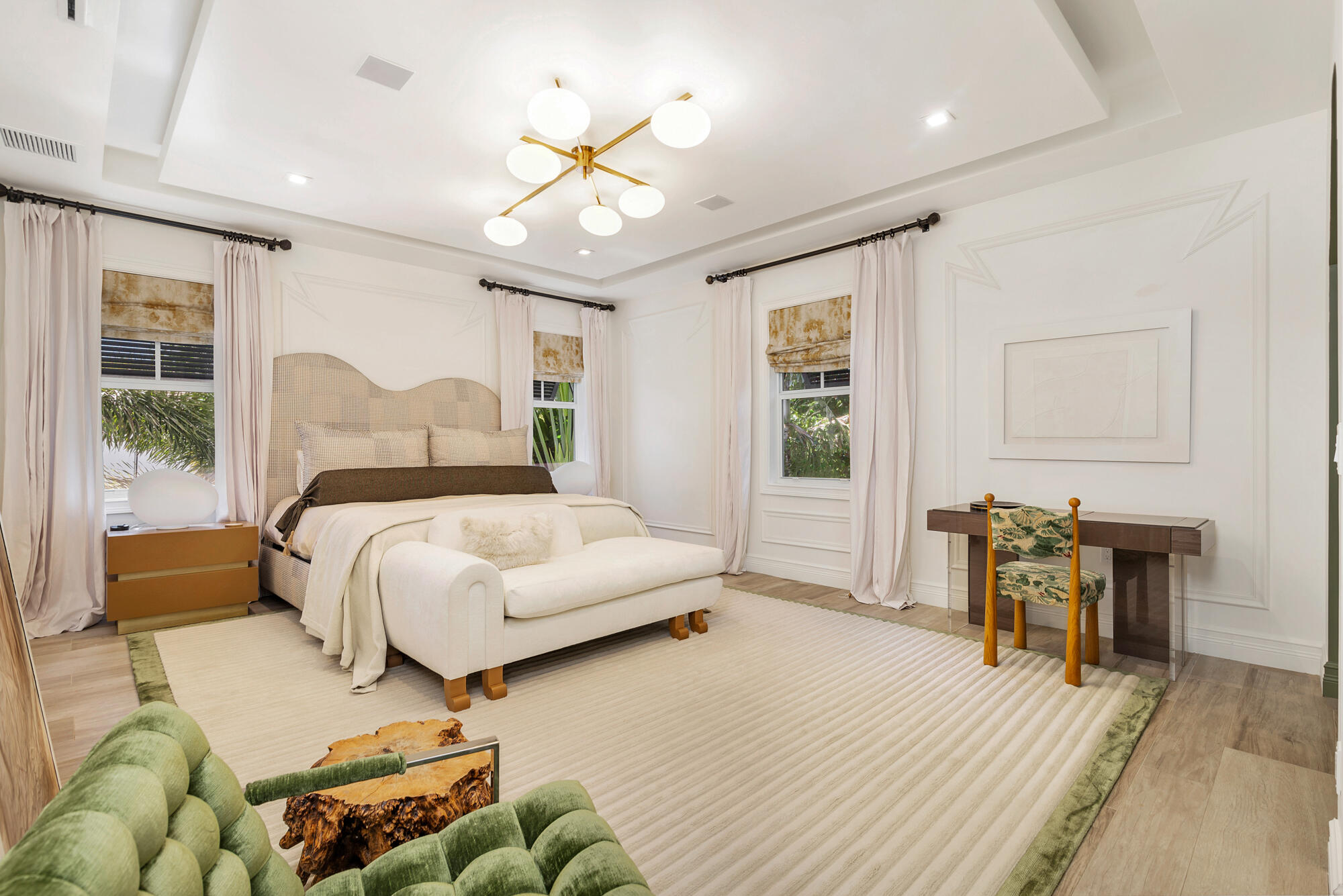 140 Edmor Road West Palm Beach, FL 33405 - Photo 14 of 30 a bedroom with a bed wooden floor and furniture