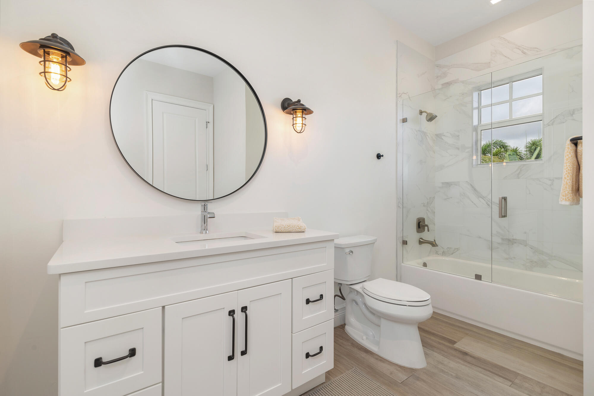 140 Edmor Road West Palm Beach, FL 33405 - Photo 18 of 30 a bathroom with a sink a toilet and a mirror