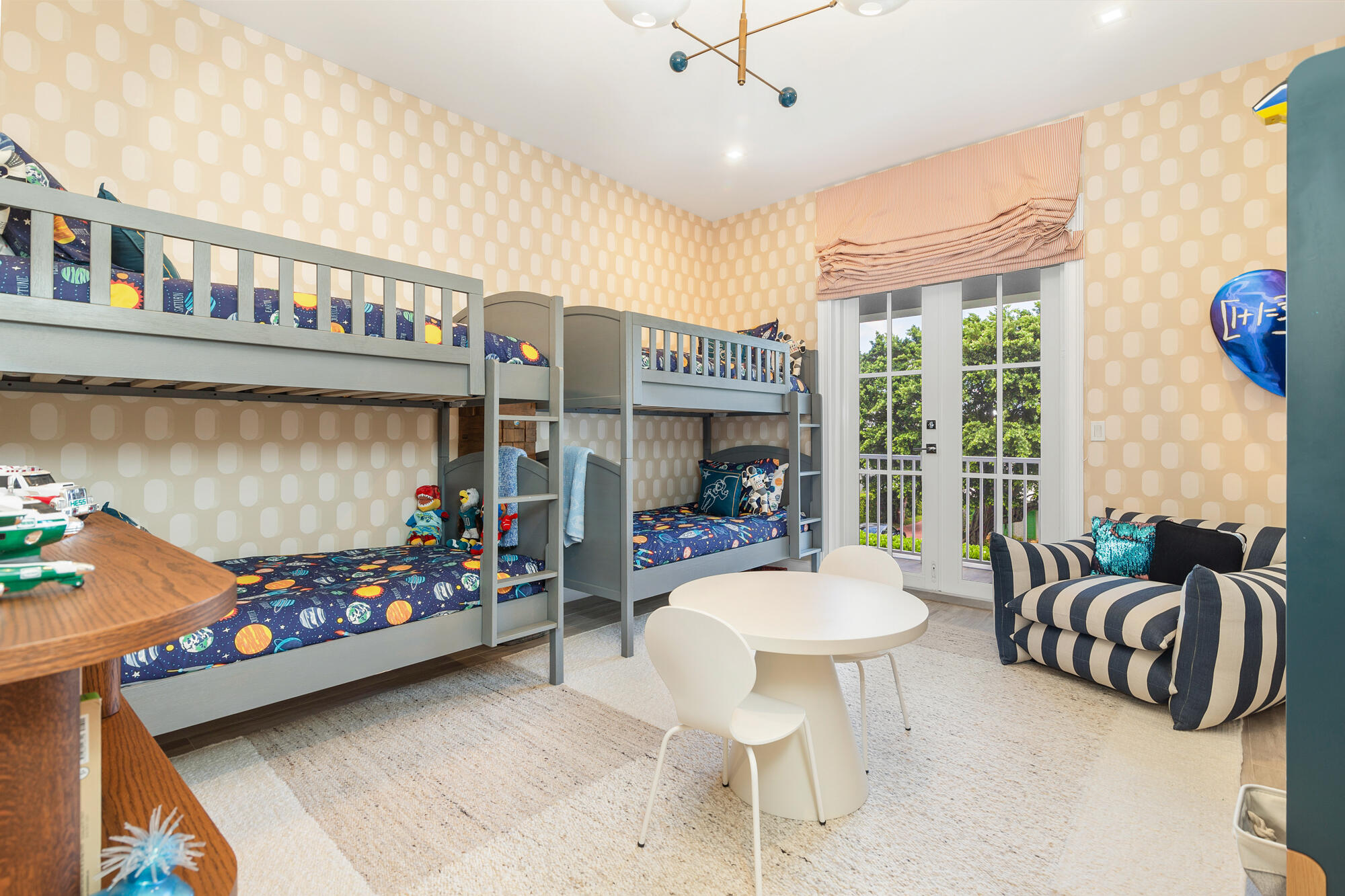 140 Edmor Road West Palm Beach, FL 33405 - Photo 20 of 30 a living room with furniture a rug and a chandelier